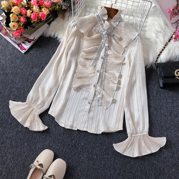 Új modell női ing pólógallérral és flitterekkel fehér és bézs színben