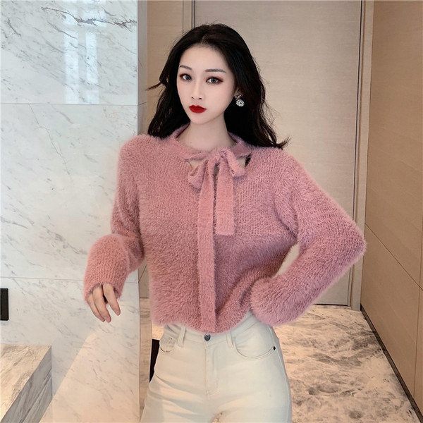 Pulover de damă pufos roz cu legături la decolteu