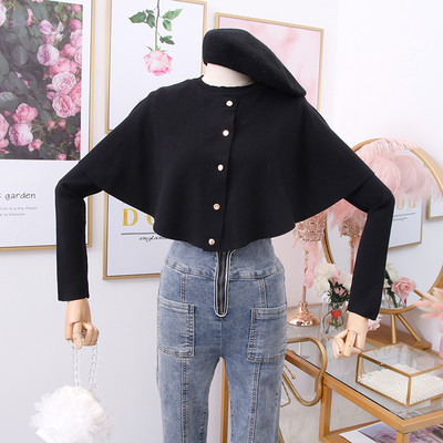 Μοντέρνο γυναικείο πουλόβερ με κουμπιά σε καφέ και μαύρο χρώμα