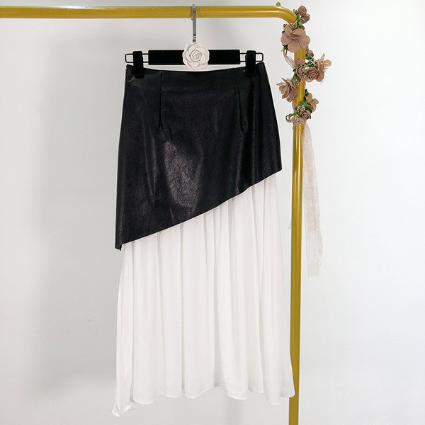 Fusta de dama cu croiala lunga cu bucati din piele ecologica