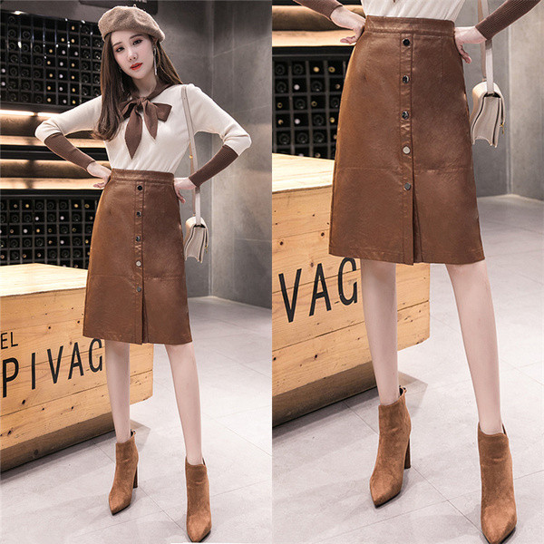 Модерна дамска пола с копчета от еко кожа в кафяв и черен цвят