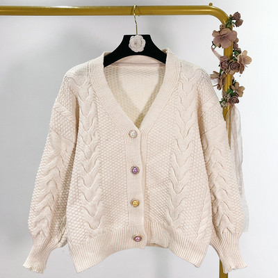 Къса дамска жилетка в бял и розов цвят с копчета