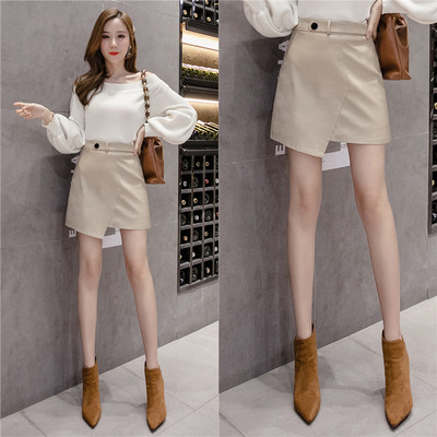 Асиметрична дамска пола от еко кожа в черен и бежов цвят