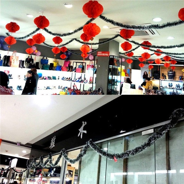 Коледен гирлянд в тъмно зелен цвят с бели връхчета - 2 метра 