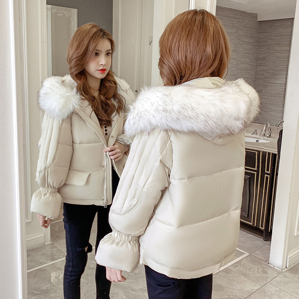 Нов модел зимно дамско яке с джобове и качулка с пух