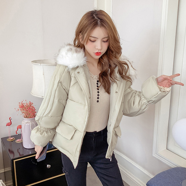 Нов модел зимно дамско яке с джобове и качулка с пух