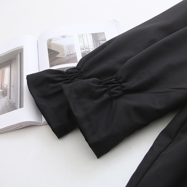 Ежедневно дамско дълго зимно яке с дълъг ръкав и връзки в черен цвят 