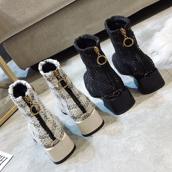 Стилни дамски боти в бял и черен цвят с цип