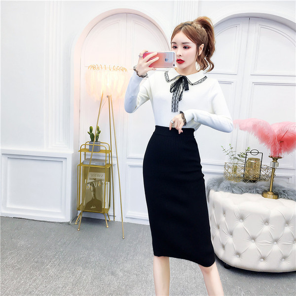 Bluză de damă din tricot subțire cu guler și panglică clasice