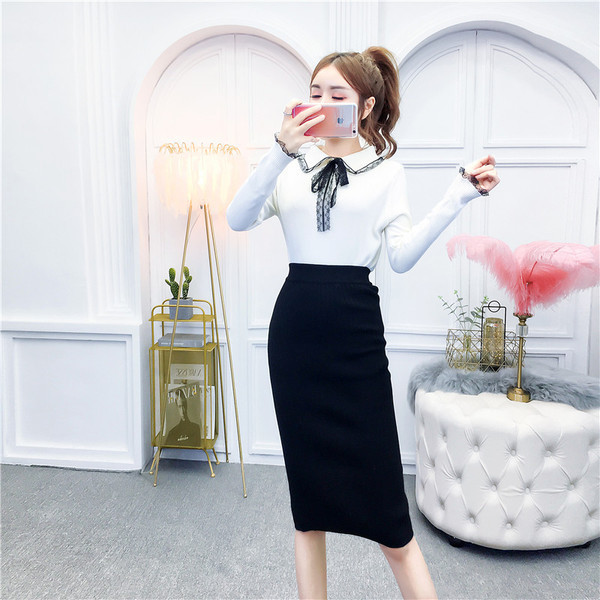 Bluză de damă din tricot subțire cu guler și panglică clasice