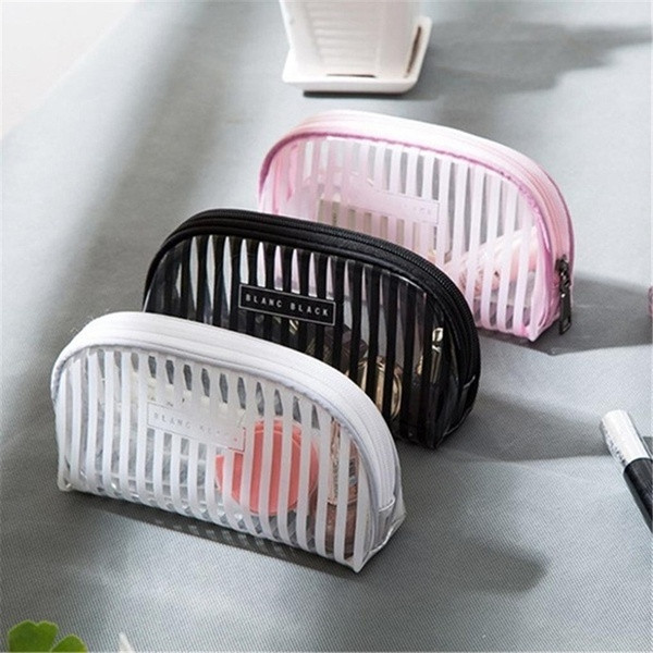 Portable and practical make-up kit in black, pink and white