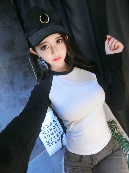 Bluză moale lejer, cu mâneci lungi și decolteu oval