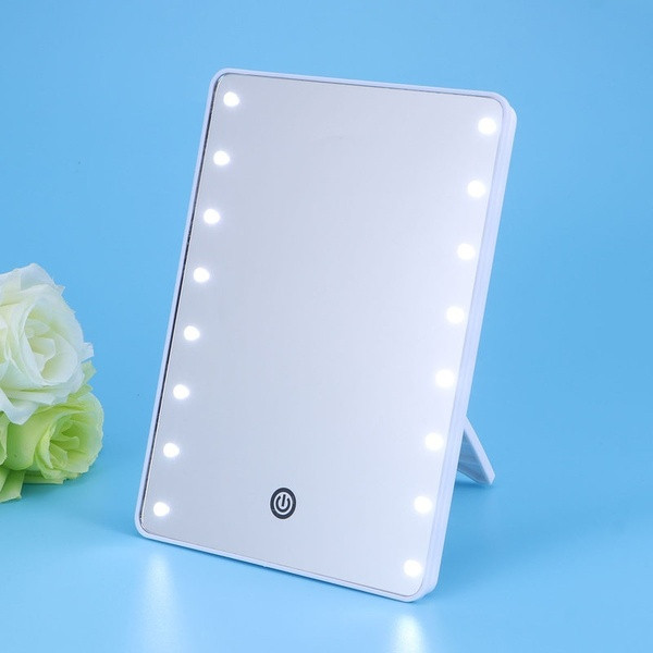 Cosmetic mirror with LED lights in black and white