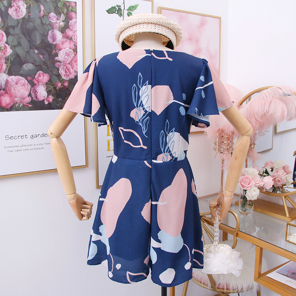 Model nou de salopetă de damă cu mâneci scurte în alb și albastru