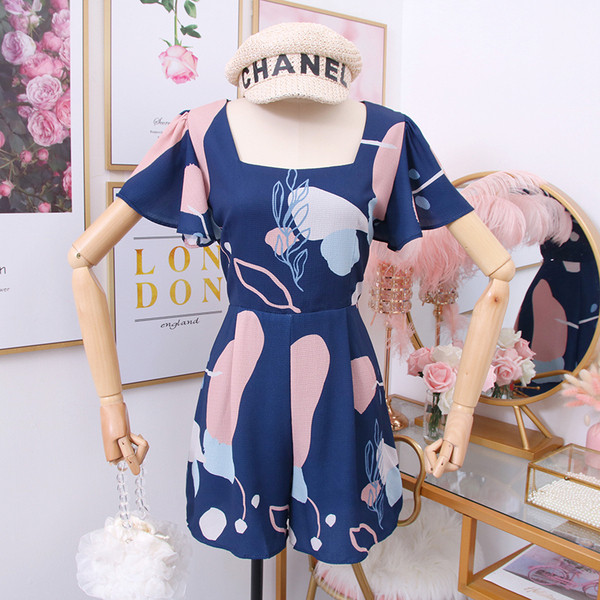 Model nou de salopetă de damă cu mâneci scurte în alb și albastru