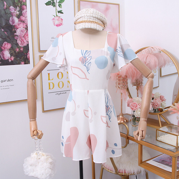 Model nou de salopetă de damă cu mâneci scurte în alb și albastru