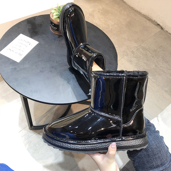 Cizme de iarna de dama moderne cu talpa plate in negru si argintiu