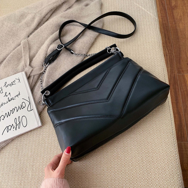 Γυναικεία μοντέρνα τσάντα με μια μακρά και μικρή χειρολαβή σε διάφορα χρώματα