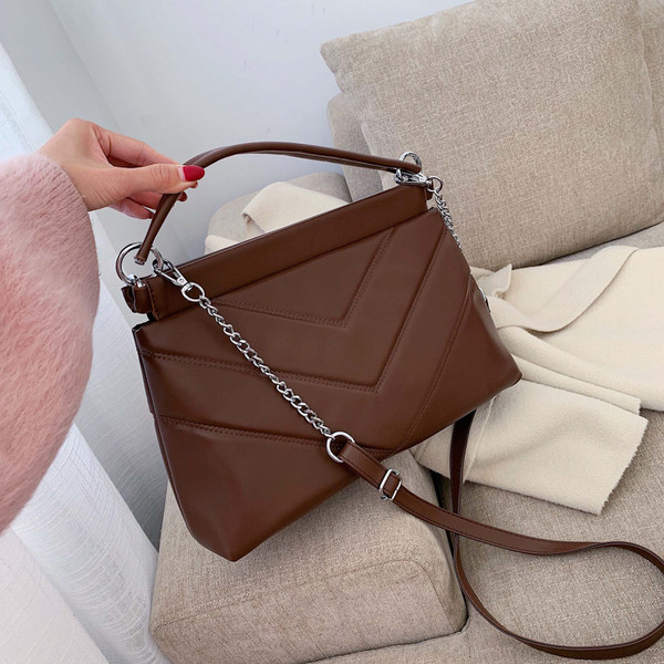 Γυναικεία μοντέρνα τσάντα με μια μακρά και μικρή χειρολαβή σε διάφορα χρώματα