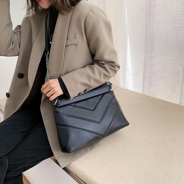 Γυναικεία μοντέρνα τσάντα με μια μακρά και μικρή χειρολαβή σε διάφορα χρώματα