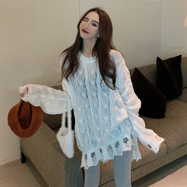 Μακρύ και φαρδύ γυναικείο πουλόβερ με σχισμένα μοτίβα