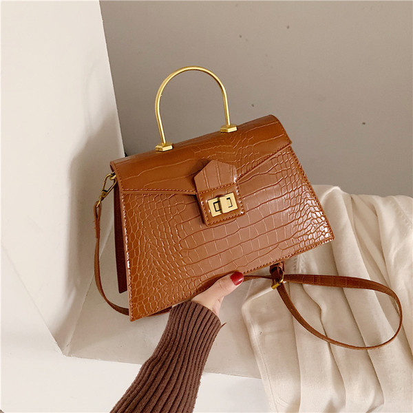 Geantă de damă elegantă, cu mâner scurt metalic