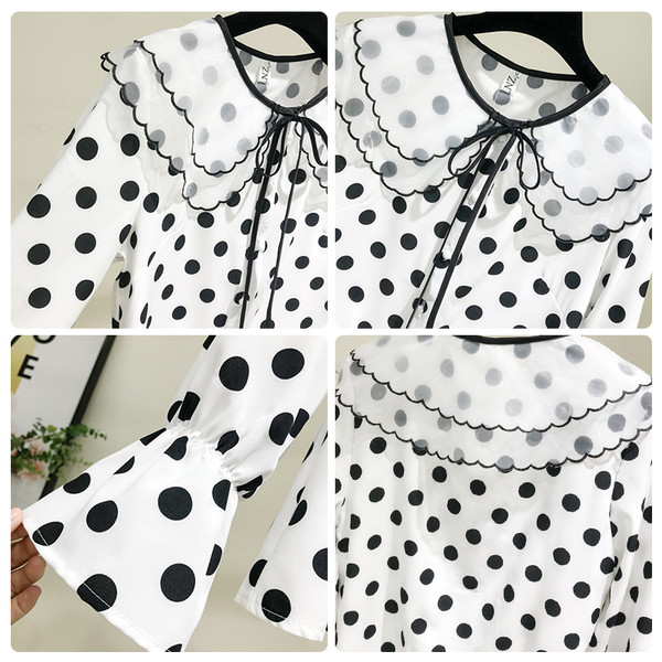 Bluză de damă modernă cu buline și mânecă lotus în alb