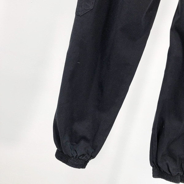 Ellentmondásos-alkalmi női nadrág fekete zsebekkel