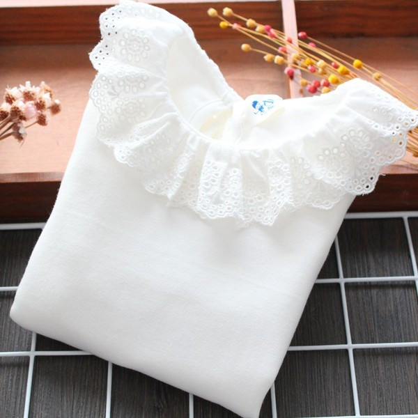 Μοντέρνα γυναικεία μπλούζα με στρογγυλη λαιμόκοψη και μακριά μανίκια σε λευκό χρώμα