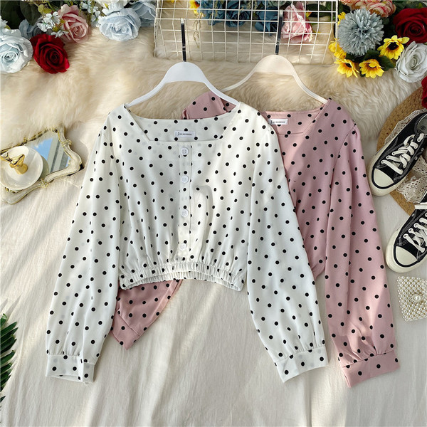 Μοντέρνα γυναικεία μπλούζα πουά σε άσπρο, ροζ, κίτρινο και πορτοκαλί χρώμα