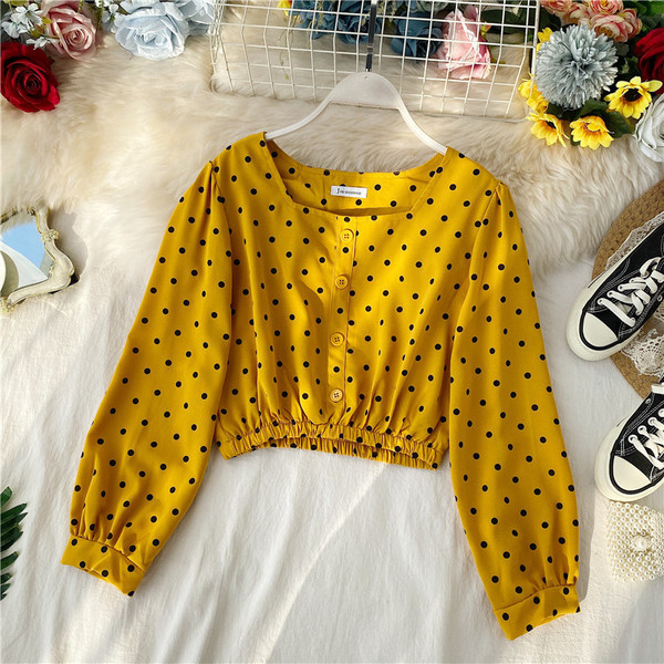 Μοντέρνα γυναικεία μπλούζα πουά σε άσπρο, ροζ, κίτρινο και πορτοκαλί χρώμα