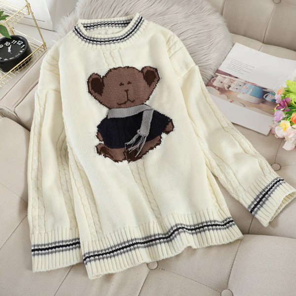 Női alkalmi pulóver ovális nyakkivágással és színes rátéttel