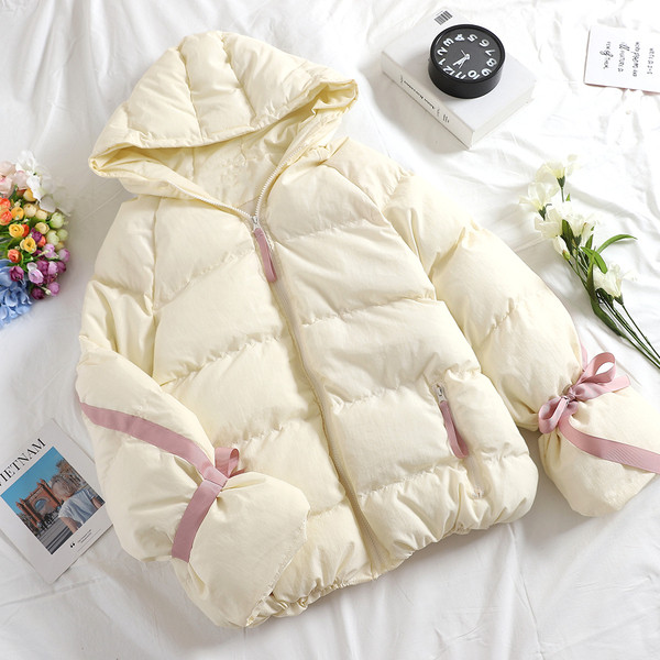 Modern női kabát cipzárral és kapucnival négy színben