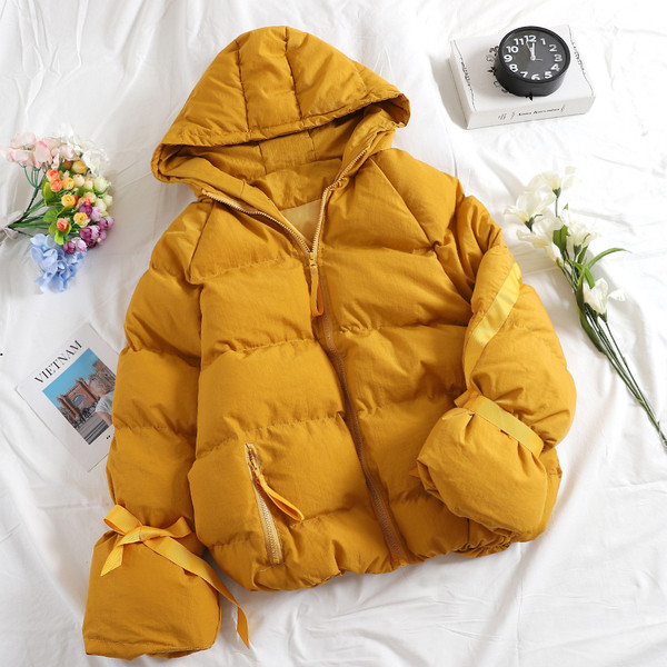 Modern női kabát cipzárral és kapucnival négy színben