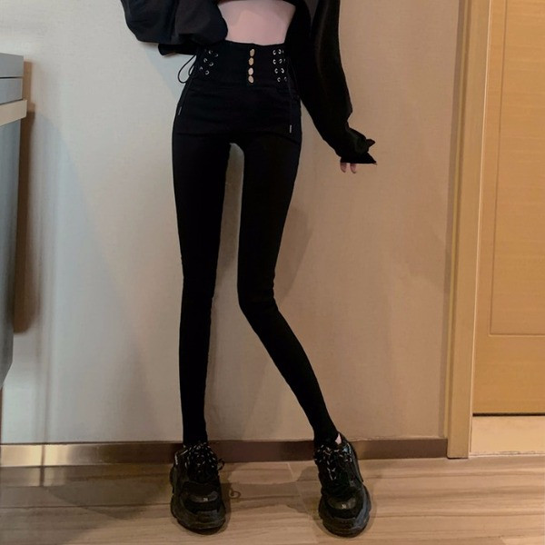 Fekete színű női testhezálló nadrág, magas derékkal, megkötővel