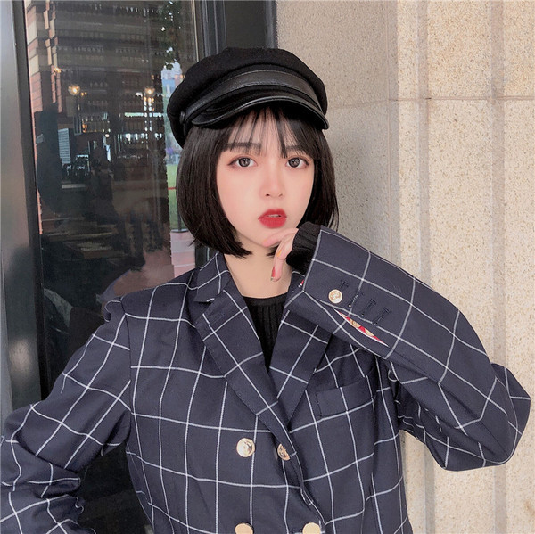 Modern női sapka napellenzővel, fekete színben