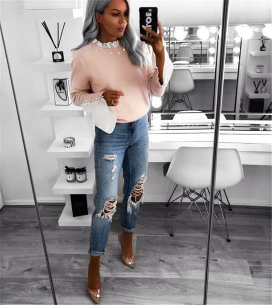 Modern női blúz gyöngyökkel és magas gallérral rózsaszínben