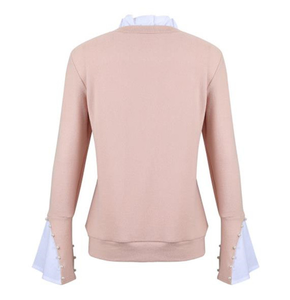 Modern női blúz gyöngyökkel és magas gallérral rózsaszínben