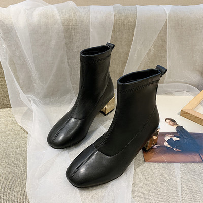 Γυναικείες έκο δερμάτινες μπότες με χοντρό χρυσό τακούνι  σε μαύρο χρώμα