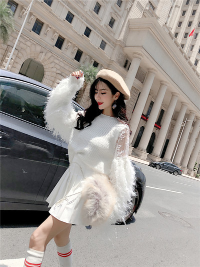 Γυναικείο πουλόβερ με μακριά μανίκια με κρόσσια σε τρία χρώματα