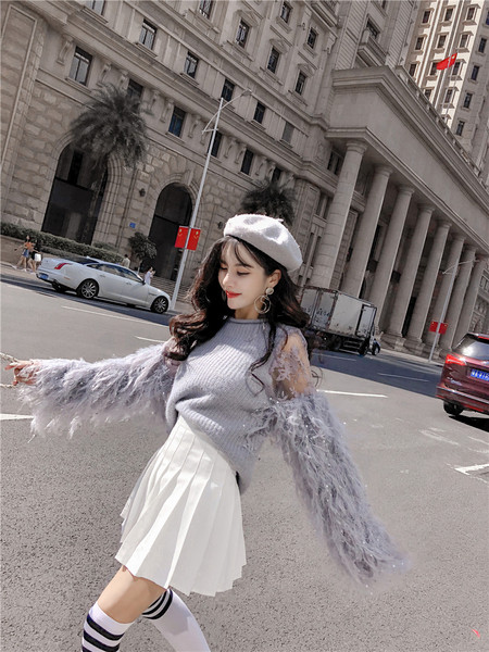 Γυναικείο πουλόβερ με μακριά μανίκια με κρόσσια σε τρία χρώματα