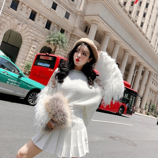 Γυναικείο πουλόβερ με μακριά μανίκια με κρόσσια σε τρία χρώματα