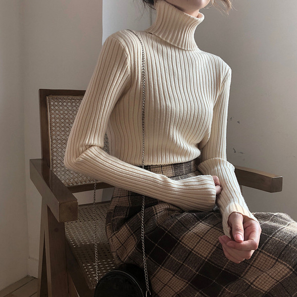 Modern női pulóver magas pólógallérral, több színben