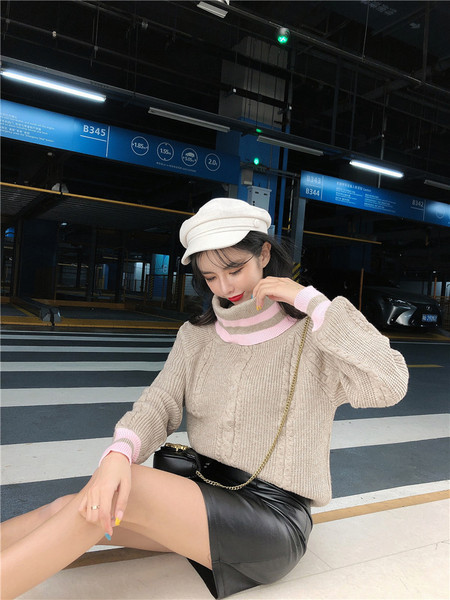 Női rövid testhezálló szoknya eko bőrből, fekete színben