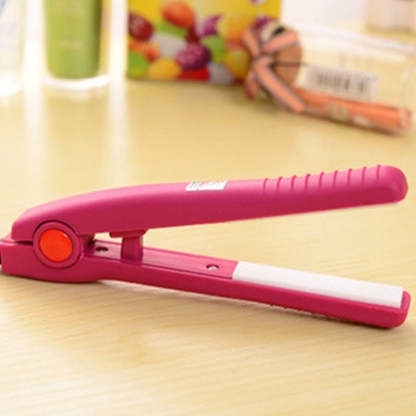 Κεραμική πρέσα μαλλιών με λειτουργία ιονισμού σε μαύρο, ροζ και μπλε χρώμα