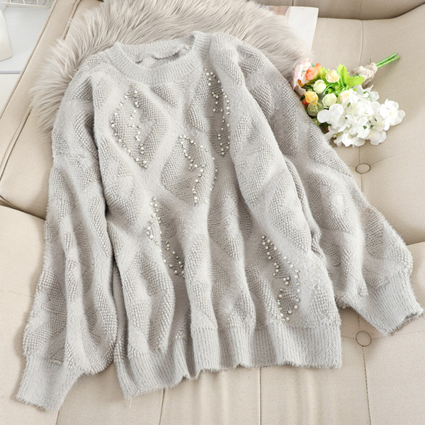 Női pulóver ovális nyakkivágással és gyöngyökkel több színben