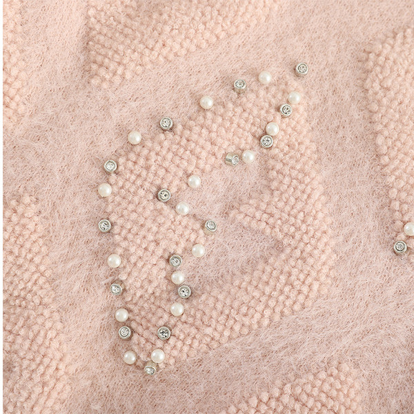 Női pulóver ovális nyakkivágással és gyöngyökkel több színben