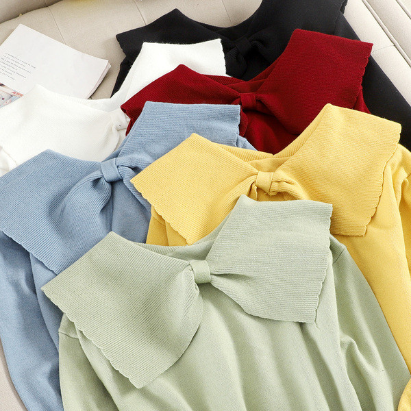 Modern női pulóver szalaggal, többféle színben