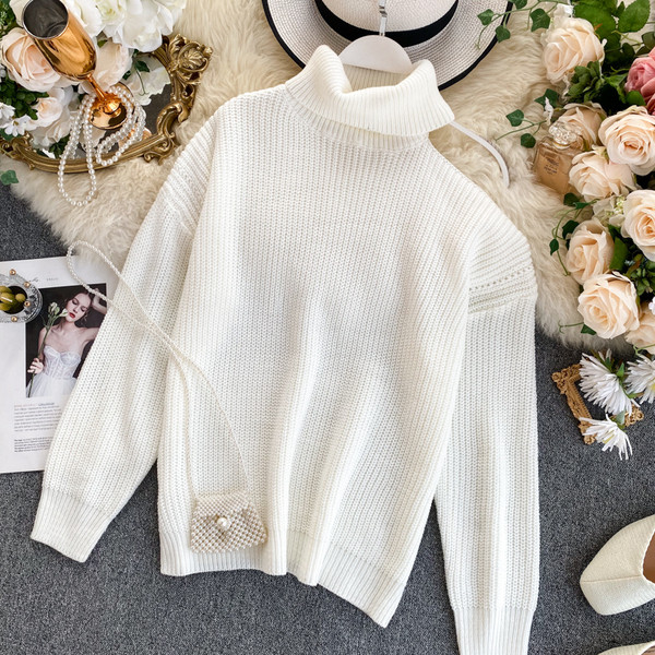 Γυναικείο πουλόβερ με ψηλό γιακά και γυμνό ώμο σε διάφορα χρώματα