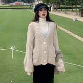 Vastag női mellény gombokkal és zsebekkel